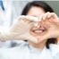 Smiling patient at dental clinic, showcasing comprehensive dental care and cosmetic dentistry services in Newnan.